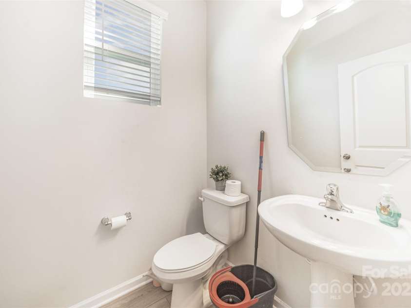 1132 Keydet Drive, Charlotte, NC 28216.  MLS# CAR4321794, YatesRealty ID 2834. Main level half bath