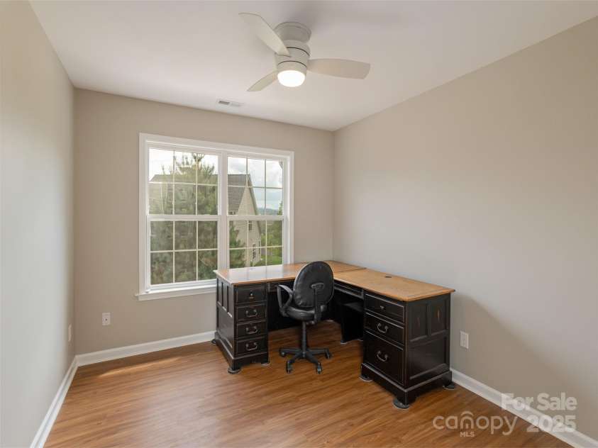 15 Dansford Lane, Arden, NC 28704.  MLS# CAR4255173, YatesRealty ID 28347. Bedroom #2 on Upper level with distant mountain views