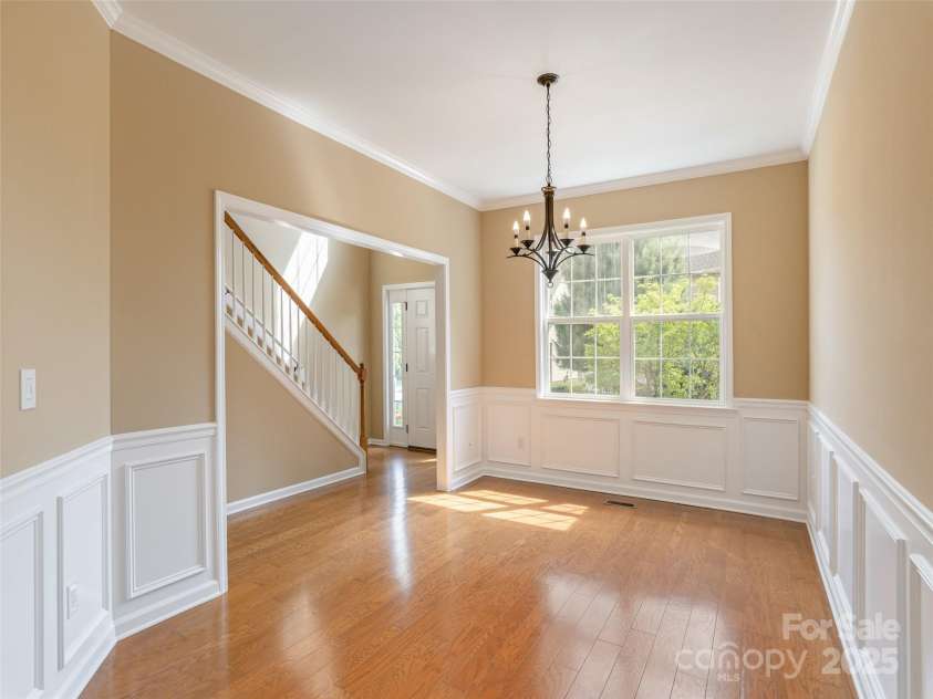 15 Dansford Lane, Arden, NC 28704.  MLS# CAR4255173, YatesRealty ID 28347. Wow!  Who doesn't LOVE wainscoting in the dining room.  Always adds a sense of luxury...