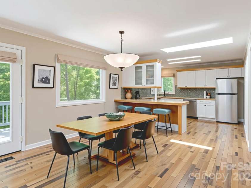 204 Pine Berry Circle, Hendersonville, NC 28739.  MLS# CAR4276519, YatesRealty ID 28353. Virtually Staged Dining