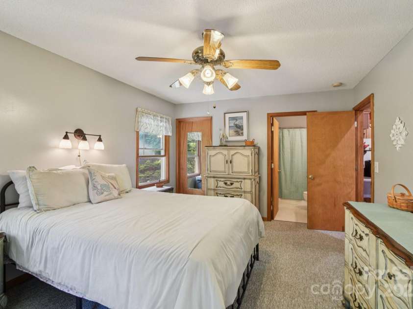 1158 Plott Balsam Road, Maggie Valley, NC 28751.  MLS# CAR4277695, YatesRealty ID 28355. Primary Bedroom