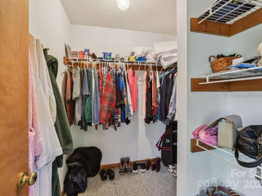 1158 Plott Balsam Road, Maggie Valley, NC 28751.  MLS# CAR4277695, YatesRealty ID 28355. Walk-in closet in the primary