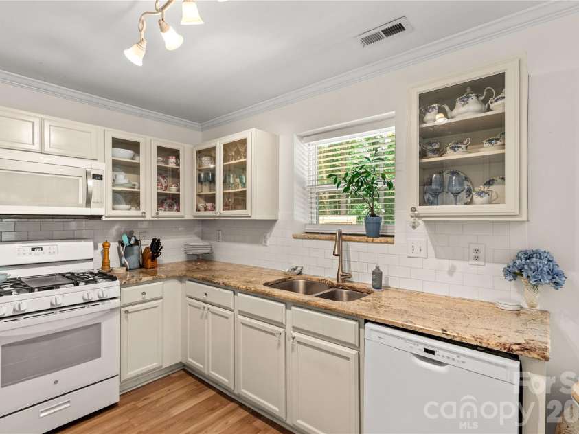 1771 Lillywood Lane, Indian Land, SC 29707.  MLS# CAR4385103, YatesRealty ID 28357. Kitchen has glass front cabinets