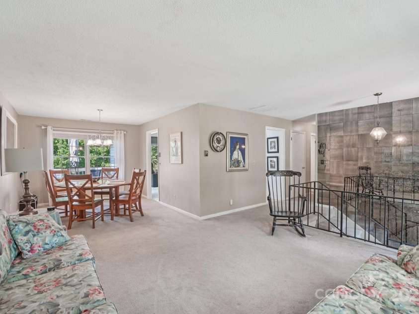 25 Hazel Court, Brevard, NC 28712.  MLS# CAR4277824, YatesRealty ID 28358. Comfortable and spacious living room