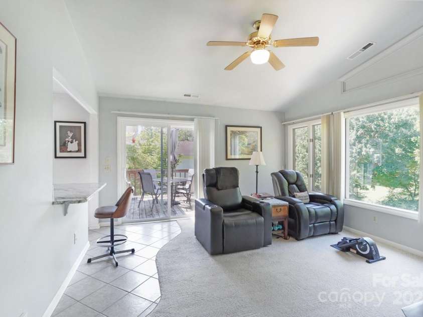 25 Hazel Court, Brevard, NC 28712.  MLS# CAR4277824, YatesRealty ID 28358. Easy access to the deck through the kitchen and family room