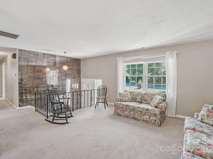 25 Hazel Court, Brevard, NC 28712.  MLS# CAR4277824, YatesRealty ID 28358. Generously sized and beautifully furnished for everyday comfort
