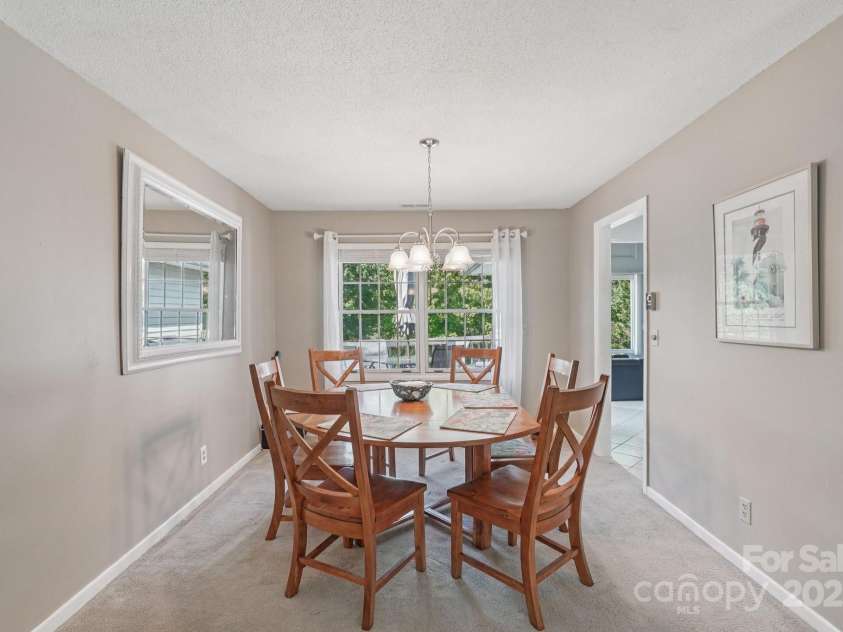 25 Hazel Court, Brevard, NC 28712.  MLS# CAR4277824, YatesRealty ID 28358. Lovely dining room to host friends and family