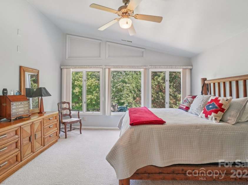 25 Hazel Court, Brevard, NC 28712.  MLS# CAR4277824, YatesRealty ID 28358. Lovely vaulted ceilings and big windows for natural light