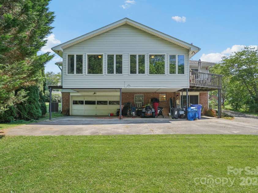 25 Hazel Court, Brevard, NC 28712.  MLS# CAR4277824, YatesRealty ID 28358. Room rear carport is big eough for 3 vehicles