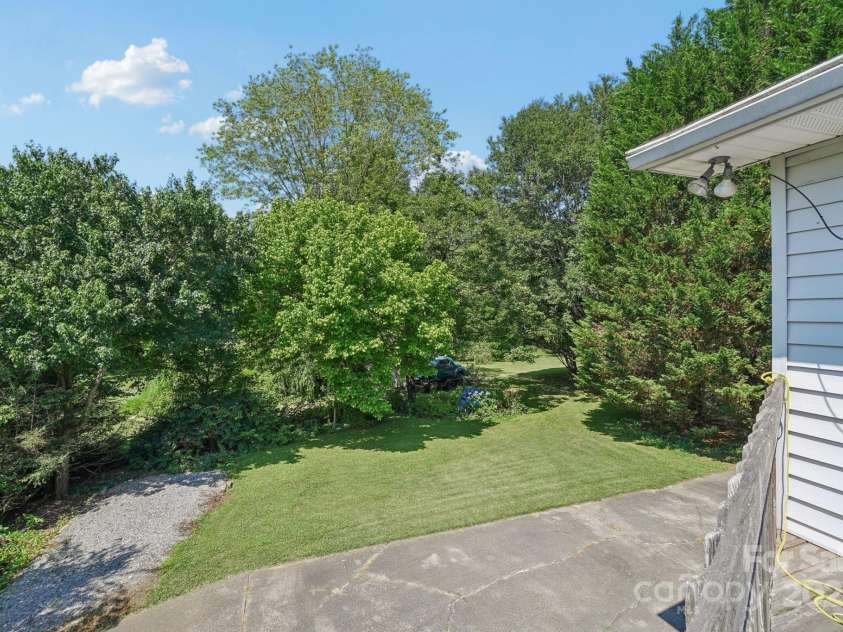 25 Hazel Court, Brevard, NC 28712.  MLS# CAR4277824, YatesRealty ID 28358. Well-maintained exterior and landscaping