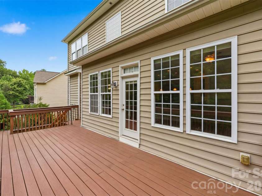 878 Treasure Court, Fort Mill, SC 29708.  MLS# CAR4307682, YatesRealty ID 28358. Deck off kitchen