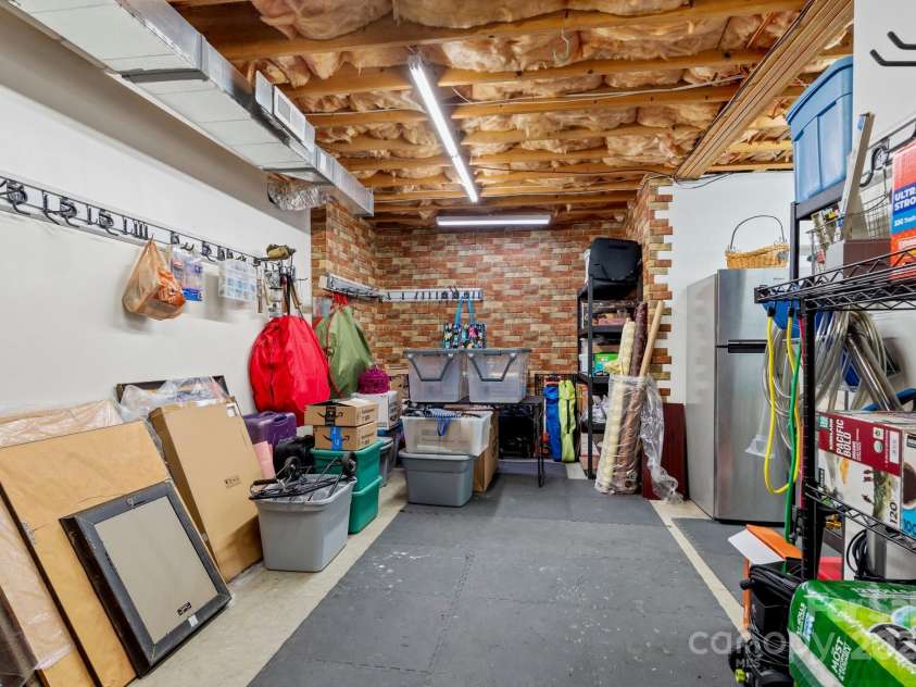 5244 Old Plantation Circle, Winston Salem, NC 27104.  MLS# CAR4283208, YatesRealty ID 28362. Heated and air conditioned workshop/storage