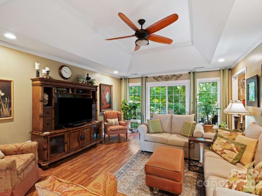 5244 Old Plantation Circle, Winston Salem, NC 27104.  MLS# CAR4283208, YatesRealty ID 28362. Living room with access to upper deck