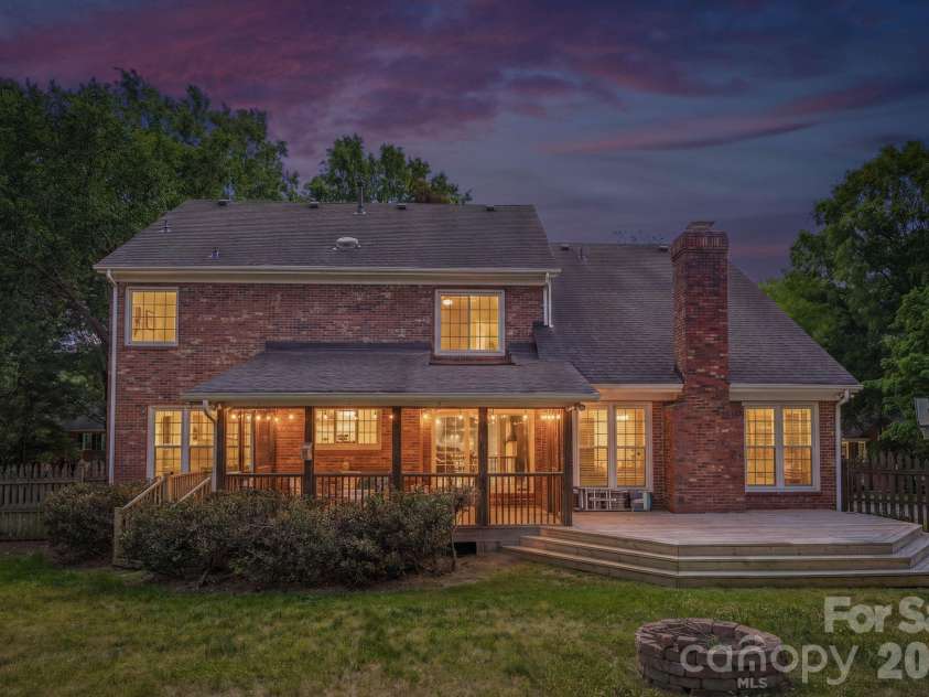 7006 Darnley Place, Charlotte, NC 28226.  MLS# CAR4367074, YatesRealty ID 28363. Rear Exterior Twilight