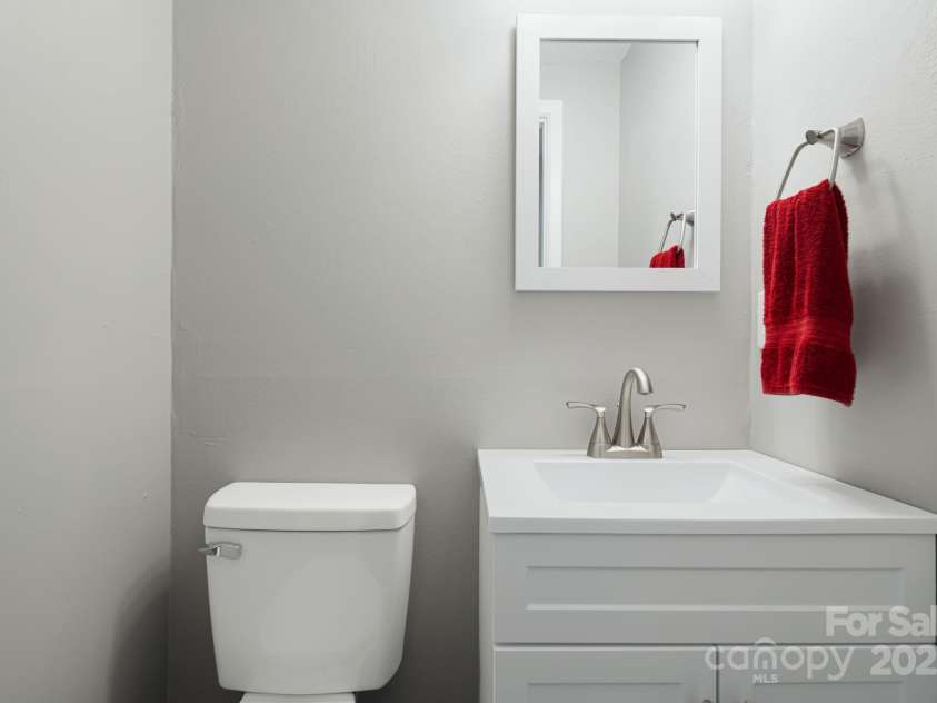 82 Maney Avenue, Asheville, NC 28804.  MLS# CAR4285420, YatesRealty ID 28365. 1/2 Bath is convenient to all of the bedrooms.