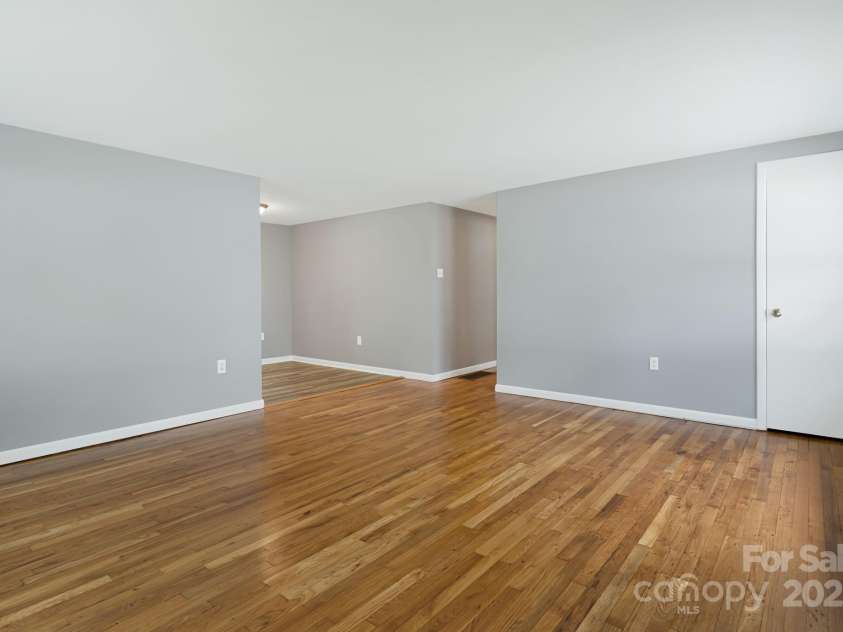 82 Maney Avenue, Asheville, NC 28804.  MLS# CAR4285420, YatesRealty ID 28365. Everything shines in the living room!