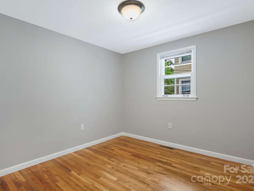 82 Maney Avenue, Asheville, NC 28804.  MLS# CAR4285420, YatesRealty ID 28365. Guest bedroom #1.