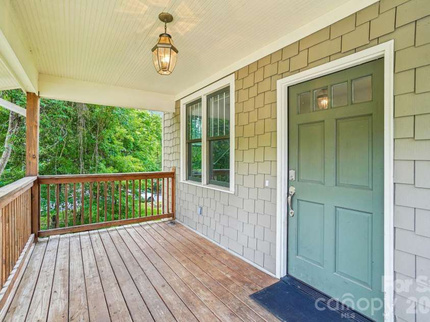 25 Houston Street, Asheville, NC 28801.  MLS# CAR4387541, YatesRealty ID 28369. Covered front deck main level
