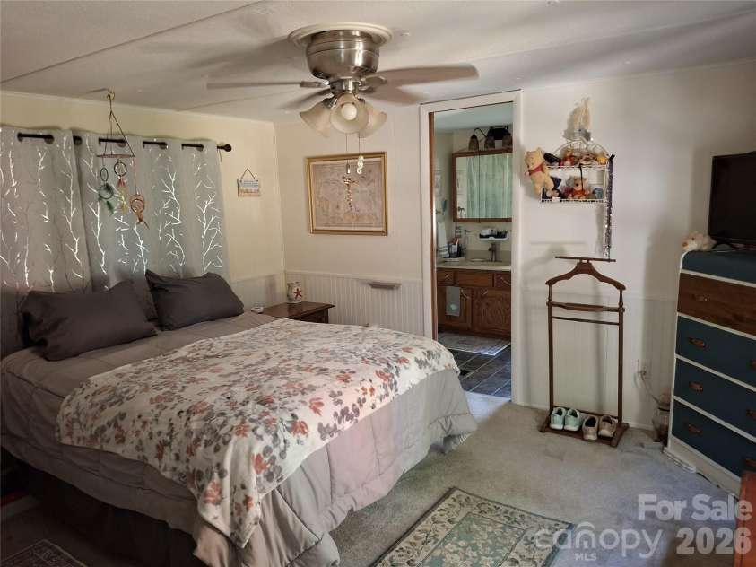 4230 Chimney Rock Road, Hendersonville, NC 28792.  MLS# CAR4309890, YatesRealty ID 2837. Primary Bedroom
