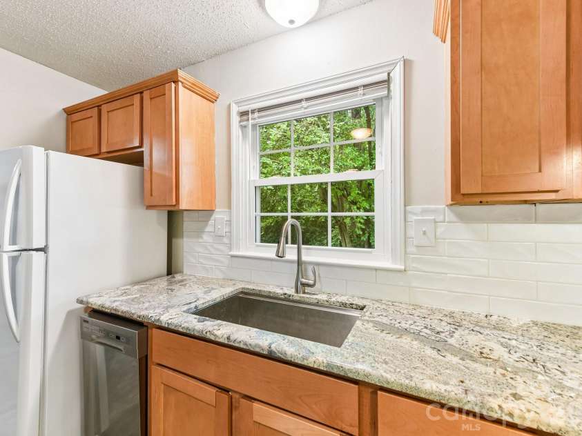933 Clanton Road, Charlotte, NC 28217.  MLS# CAR4384837, YatesRealty ID 28371. 