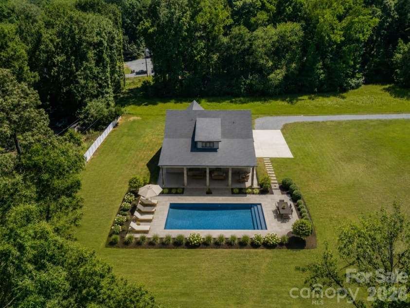 112 Jim Parker Road, Wesley Chapel, NC 28110.  MLS# CAR4404728, YatesRealty ID 28376. Image is rendering of potential future pool