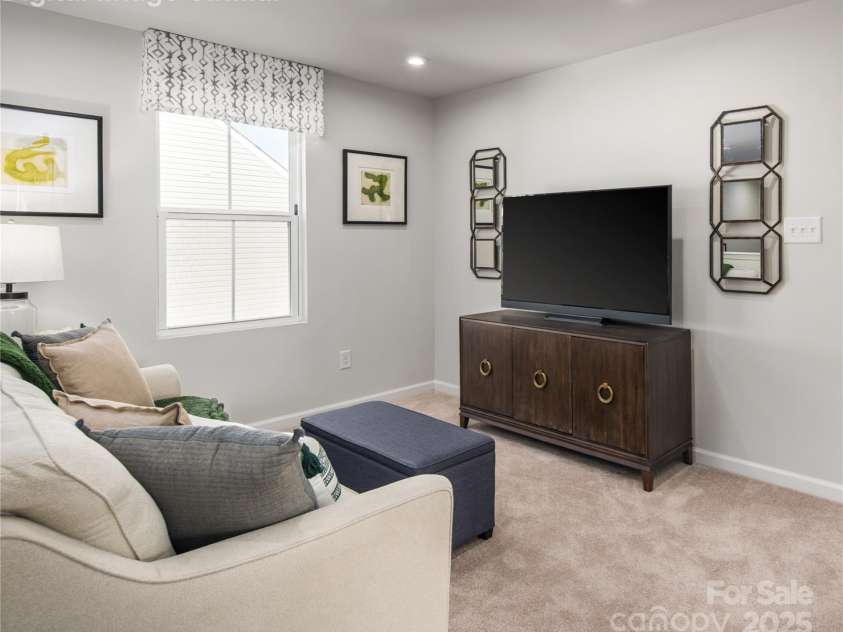 1274 Elm Forest Lane, China Grove, NC 28023.  MLS# CAR4275872, YatesRealty ID 28382. A flexible space on the main level provides endless possibilities, whether you need a study, home office, or a personalized retreat.