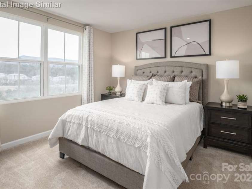 5742 Knox Lane, Kannapolis, NC 28081.  MLS# CAR4278228, YatesRealty ID 28383. Neutral colors and natural light enhance the spacious feel of this owner’s suite, complete with a large walk-in closet.