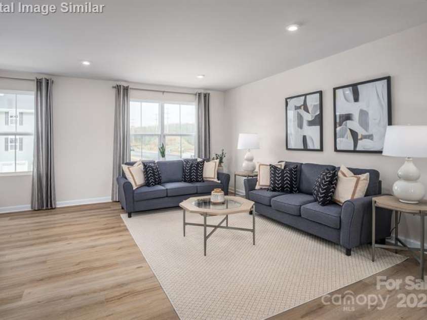 5742 Knox Lane, Kannapolis, NC 28081.  MLS# CAR4278228, YatesRealty ID 28383. Sun-filled great room with open floor plan — ideal for entertaining and everyday comfort.