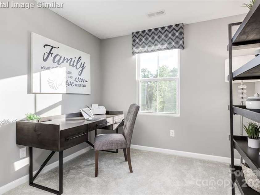 5742 Knox Lane, Kannapolis, NC 28081.  MLS# CAR4278228, YatesRealty ID 28383. Versatile third Bedroom - perfect as a guest room, playroom, or home office.