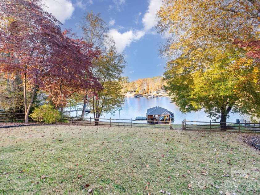 7088 Wateredge Drive, Sherrills Ford, NC 28673.  MLS# CAR4319467, YatesRealty ID 28384. Back yard