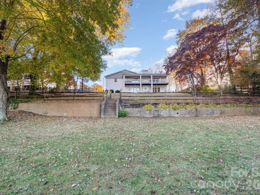 7088 Wateredge Drive, Sherrills Ford, NC 28673.  MLS# CAR4319467, YatesRealty ID 28384. Back yard