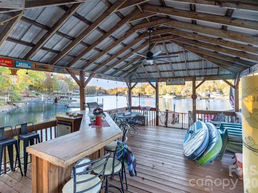 7088 Wateredge Drive, Sherrills Ford, NC 28673.  MLS# CAR4319467, YatesRealty ID 28384. Covered dock with bar