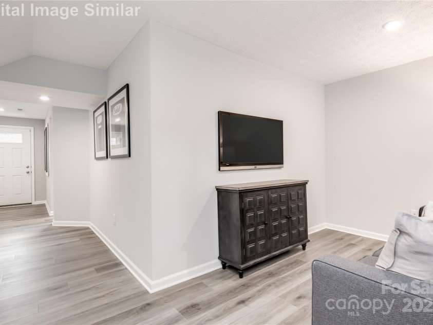 7020 Capstan Terrace, Charlotte, NC 28269.  MLS# CAR4280579, YatesRealty ID 28386. Flex space on the lower level