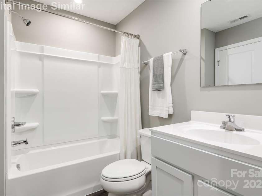 7020 Capstan Terrace, Charlotte, NC 28269.  MLS# CAR4280579, YatesRealty ID 28386. Owner's Ensuite Bathroom
