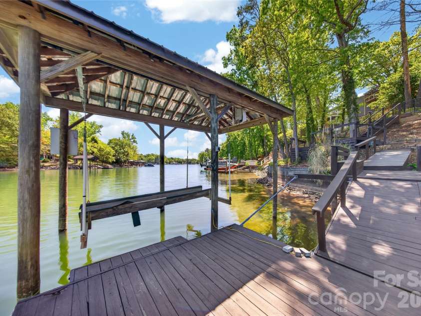 16118 Tana Tea Circle, Tega Cay, SC 29708.  MLS# CAR4368051, YatesRealty ID 28390. Boat Lift