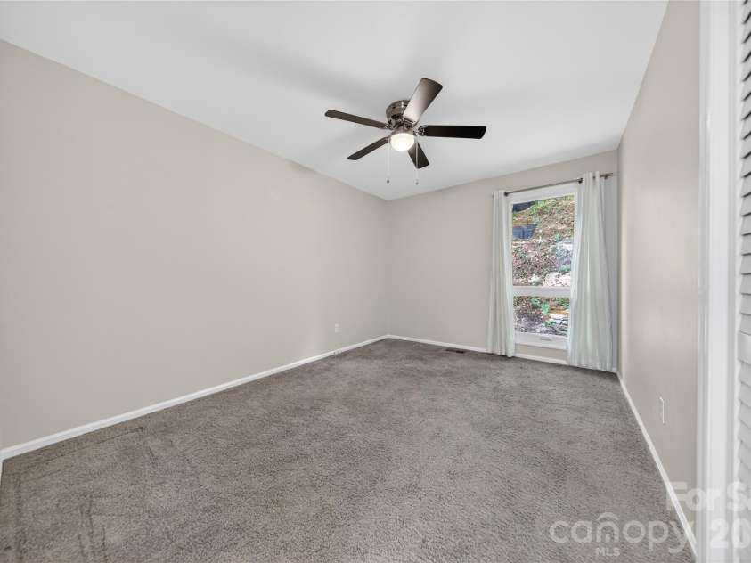 16118 Tana Tea Circle, Tega Cay, SC 29708.  MLS# CAR4368051, YatesRealty ID 28390. First Floor Guest Suite