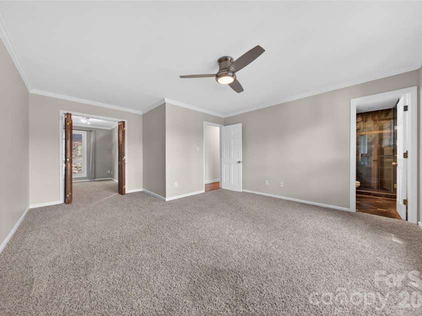 16118 Tana Tea Circle, Tega Cay, SC 29708.  MLS# CAR4368051, YatesRealty ID 28390. First Floor Primary Suite