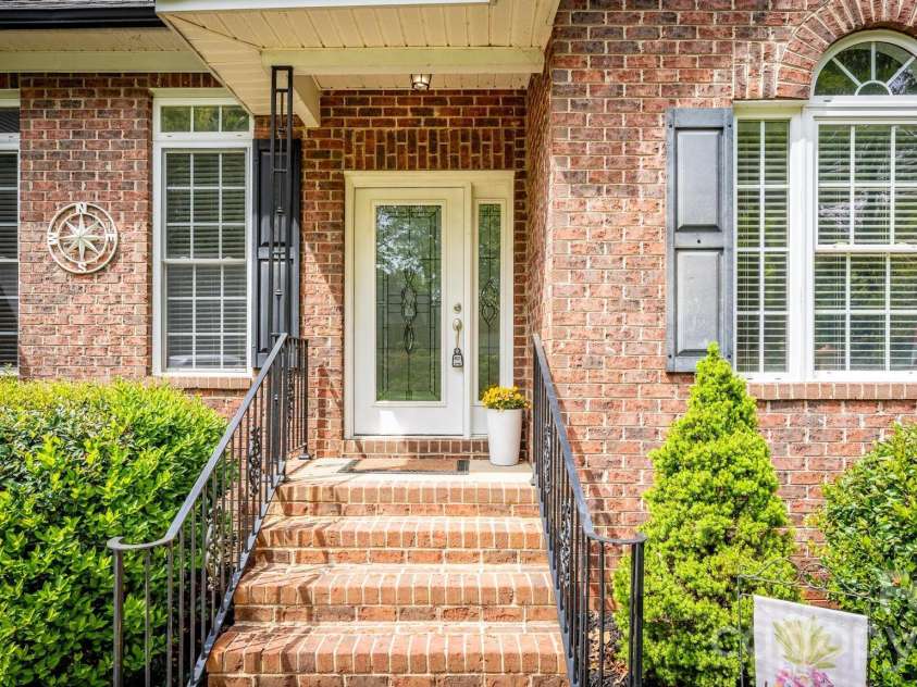 7867 Golf Course Drive, Denver, NC 28037.  MLS# CAR4355635, YatesRealty ID 28391. Covered Entry