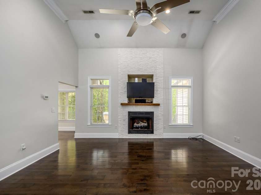 7867 Golf Course Drive, Denver, NC 28037.  MLS# CAR4355635, YatesRealty ID 28391. Great Room w/Stacked Stone Fireplace