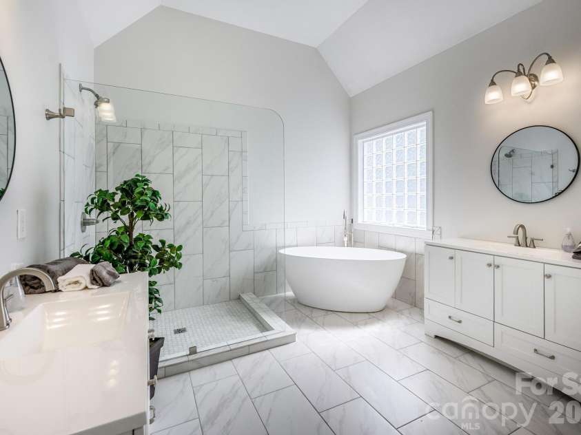 7867 Golf Course Drive, Denver, NC 28037.  MLS# CAR4355635, YatesRealty ID 28391. Spa-Like Primary Bath w/Dual Vanities