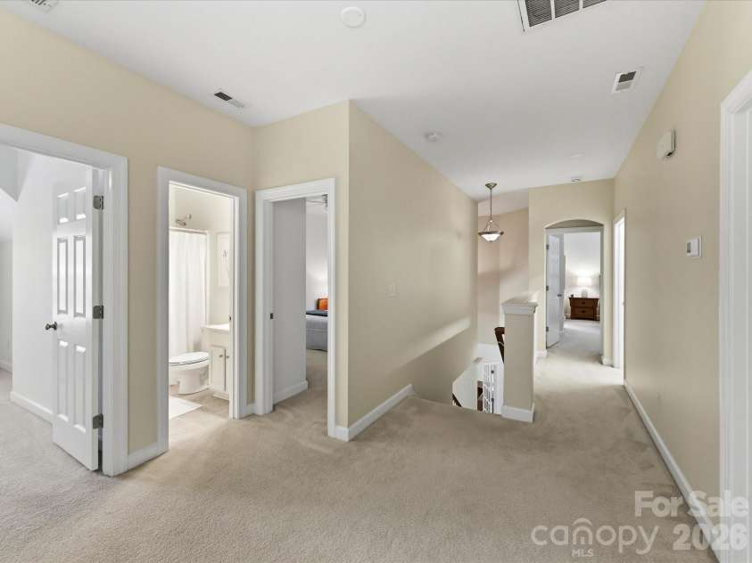 8611 Covedale Crossings Circle, Cornelius, NC 28031.  MLS# CAR4378956, YatesRealty ID 28395. Spacious upper-level landing provides added versatility and convenient access to secondary bedrooms and baths with an open, airy feel throughout.