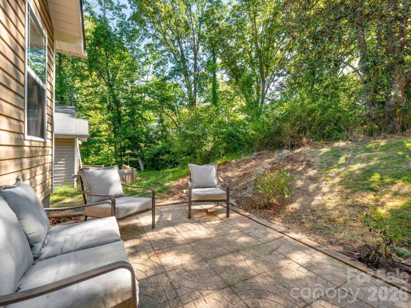 24 Hilldale Road, Asheville, NC 28803.  MLS# CAR4382558, YatesRealty ID 28400. Back patio
