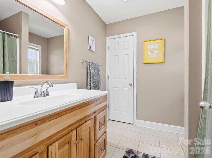 24 Hilldale Road, Asheville, NC 28803.  MLS# CAR4382558, YatesRealty ID 28400. Primary bath