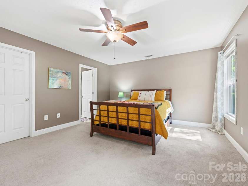 24 Hilldale Road, Asheville, NC 28803.  MLS# CAR4382558, YatesRealty ID 28400. Spacious primary bedroom