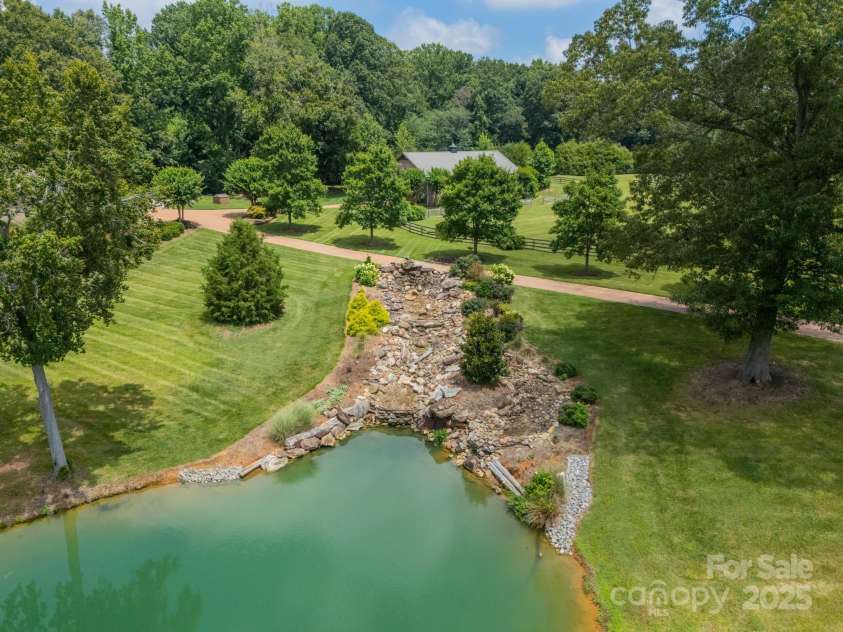 140 Huncoat Hollow Lane, Iron Station, NC 28080.  MLS# CAR4285209, YatesRealty ID 28401. 