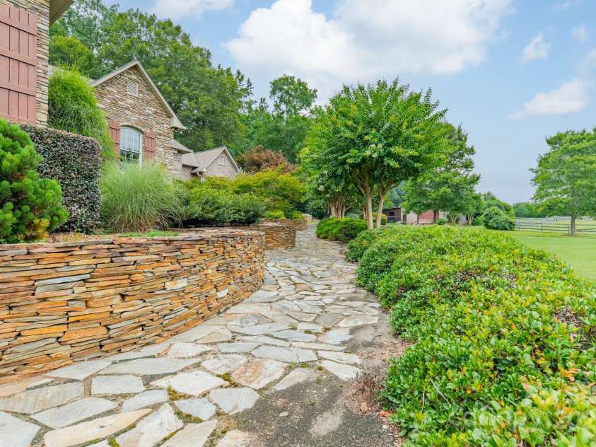 140 Huncoat Hollow Lane, Iron Station, NC 28080.  MLS# CAR4285209, YatesRealty ID 28401. 