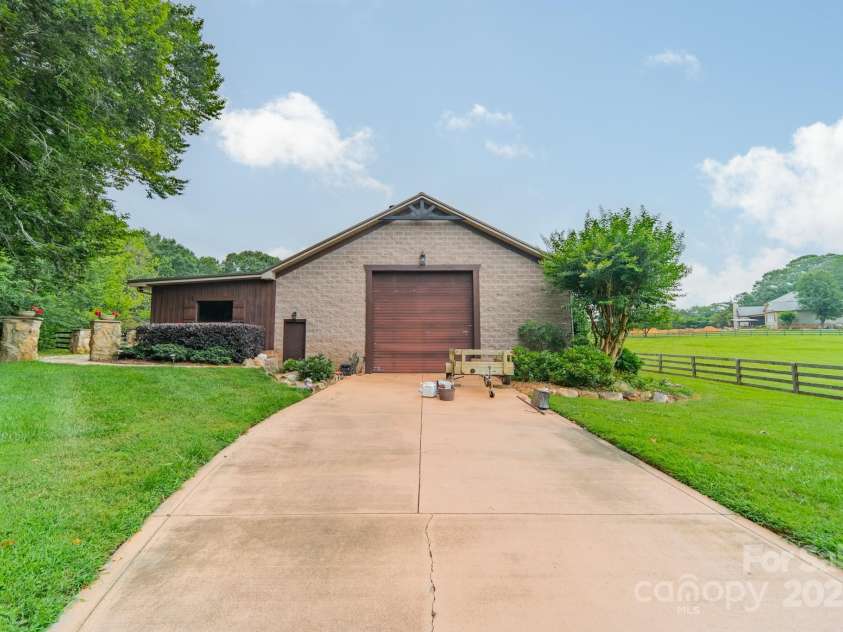 140 Huncoat Hollow Lane, Iron Station, NC 28080.  MLS# CAR4285209, YatesRealty ID 28401. 