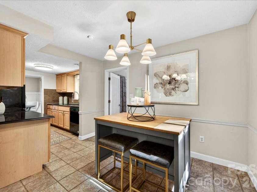 4330 Brookfield Drive, Charlotte, NC 28210.  MLS# CAR4383464, YatesRealty ID 28403. Kitchen can be expanded by adding in an island for prep space and shelving along the wall!