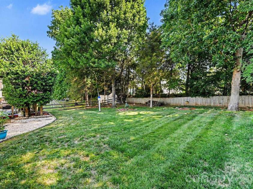 12323 Poplar Forest Drive, Charlotte, NC 28278.  MLS# CAR4382960, YatesRealty ID 28406. Backyard