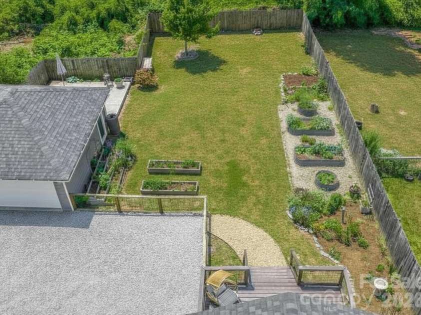 310 Hazel Mill Road, Asheville, NC 28806.  MLS# CAR4385682, YatesRealty ID 28409. Beauitful, flat and fenced back yard